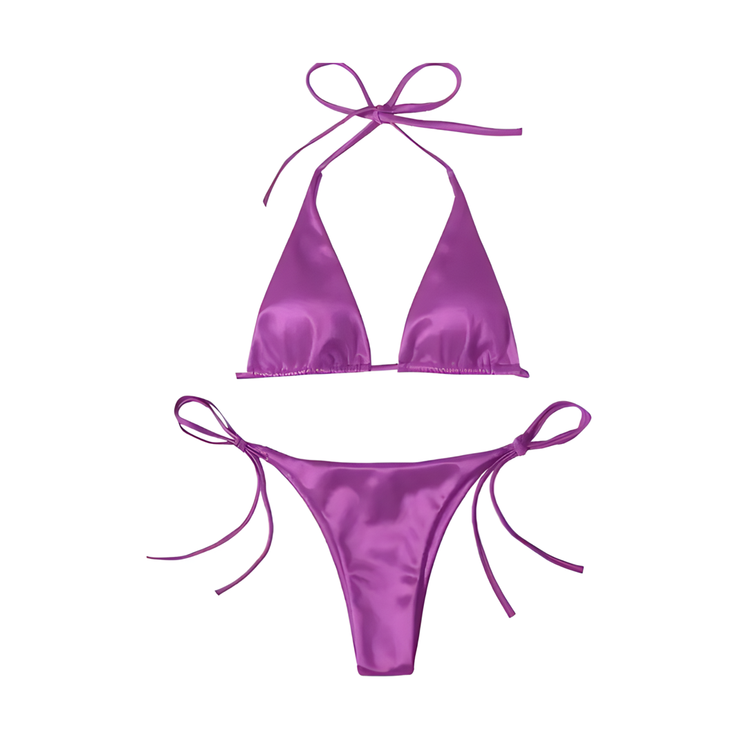 Purple Bikini, A bikini set featuring triangular soft cups with removable padding, and adjustable neck and back ties. The shiny, silky fabric maintains its luster even after swimming in the sea. The bottoms have side-tie fastenings for a personalized fit. Made from 80% polyamide and 20% elastane, this bikini is designed for comfort and style.